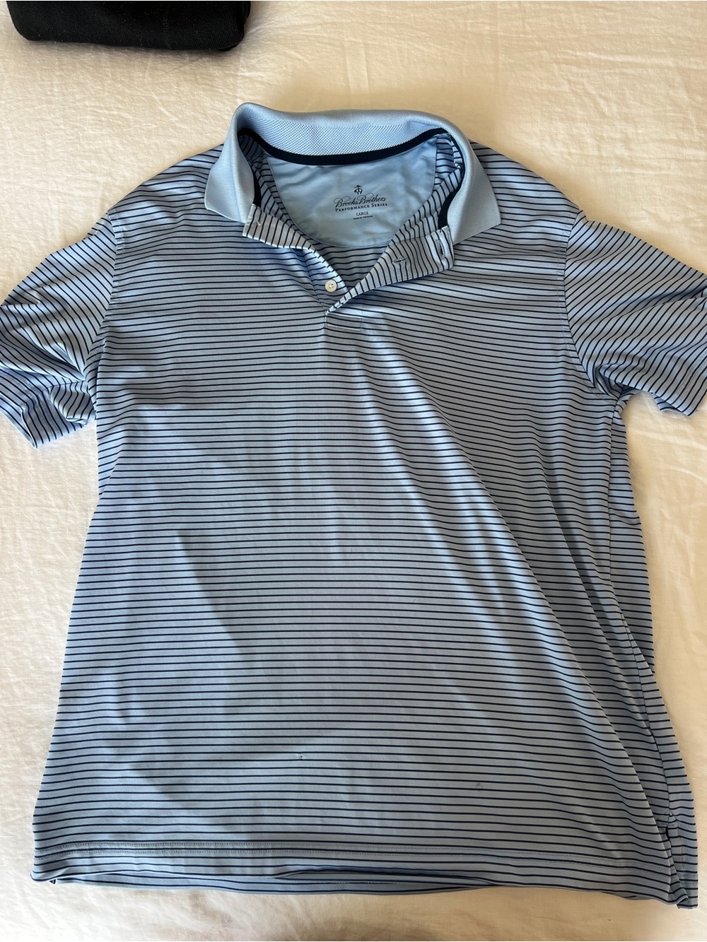 Brooks Brothers Light Blue and Navy Striped Polo with small hole